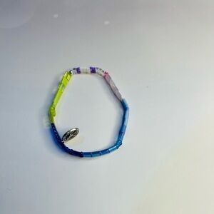 Bracelet made of Tila, Miyuki glass, bugle & seed beads & Virgin Mary charm.